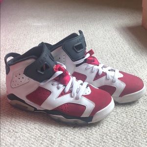 Red and black Jordan’s kids size 6.5
